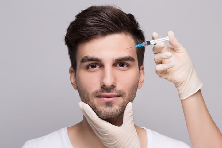 man receiving injectable treatment